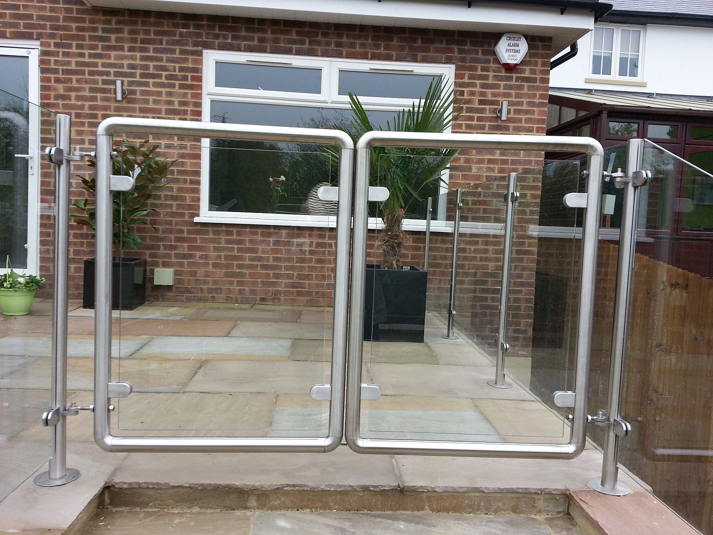 Glass balustrade with double gates hertfordshire