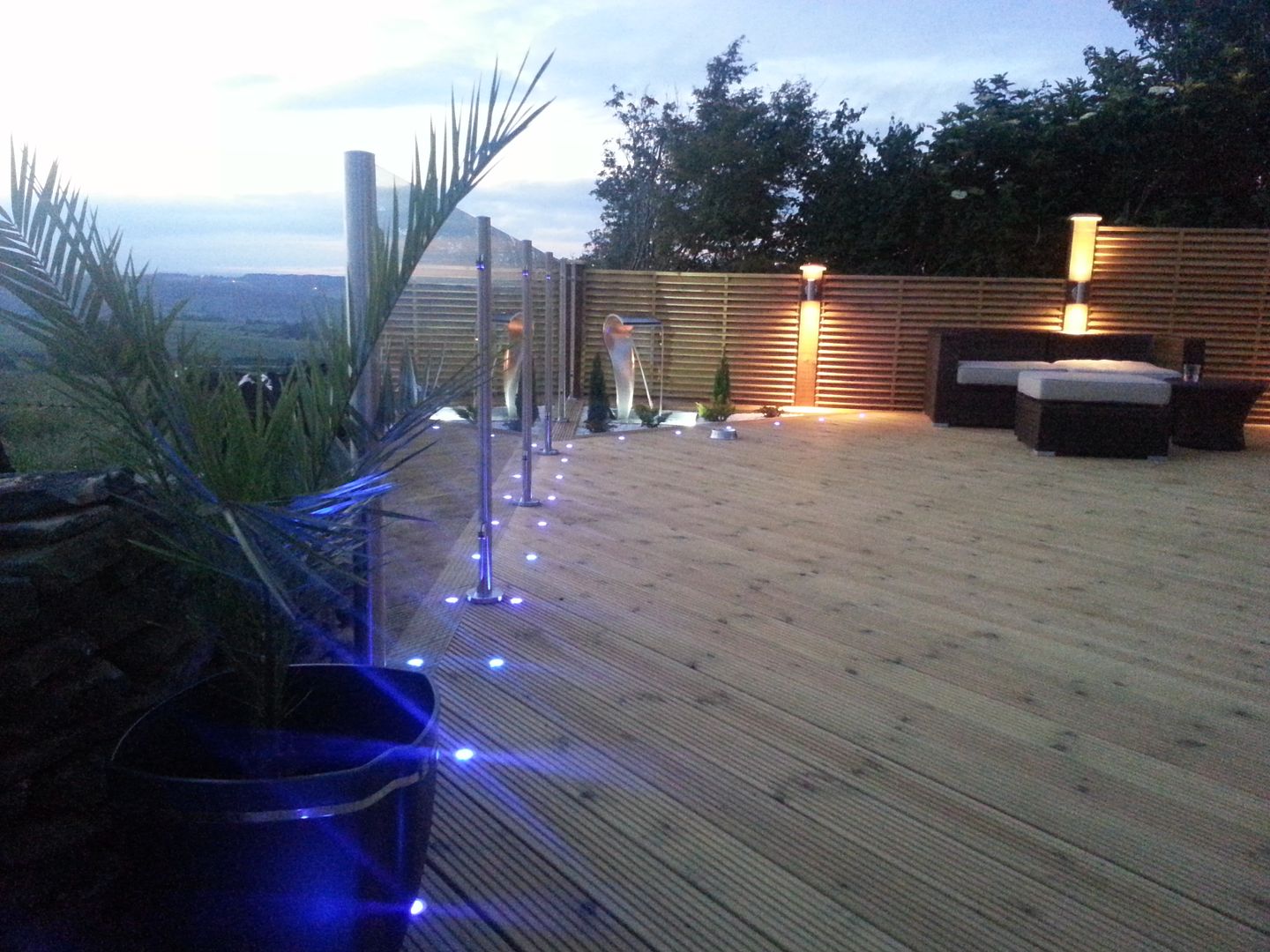 stainless steel glass balcony system with lighting on decking rails