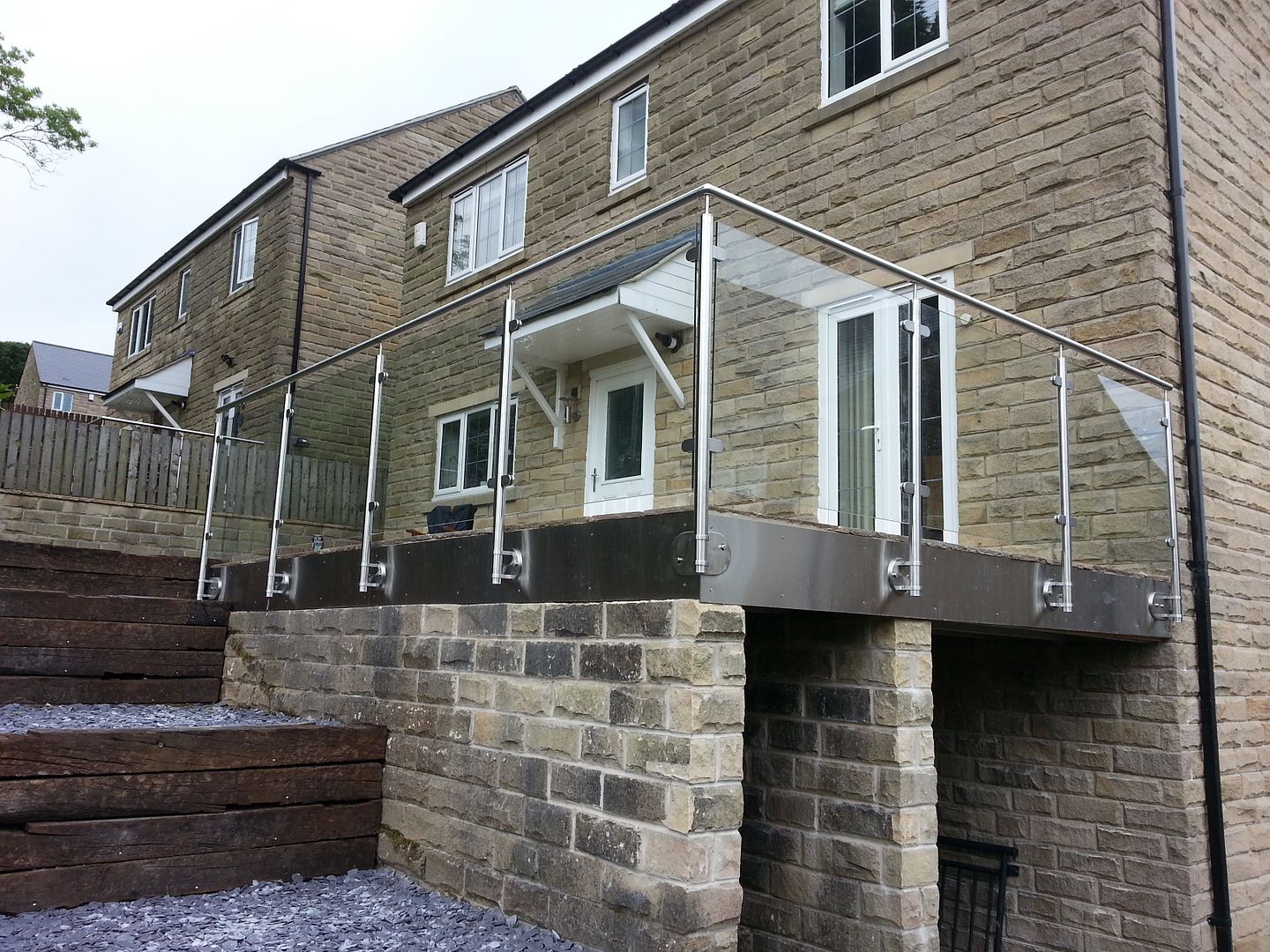 Glass balcony balustrade with stainless steel G316 uk Ripponden