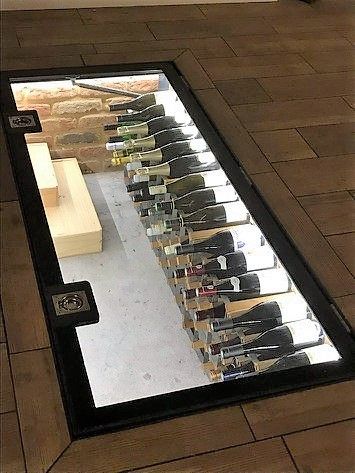 Wine cellar glass floor hinged