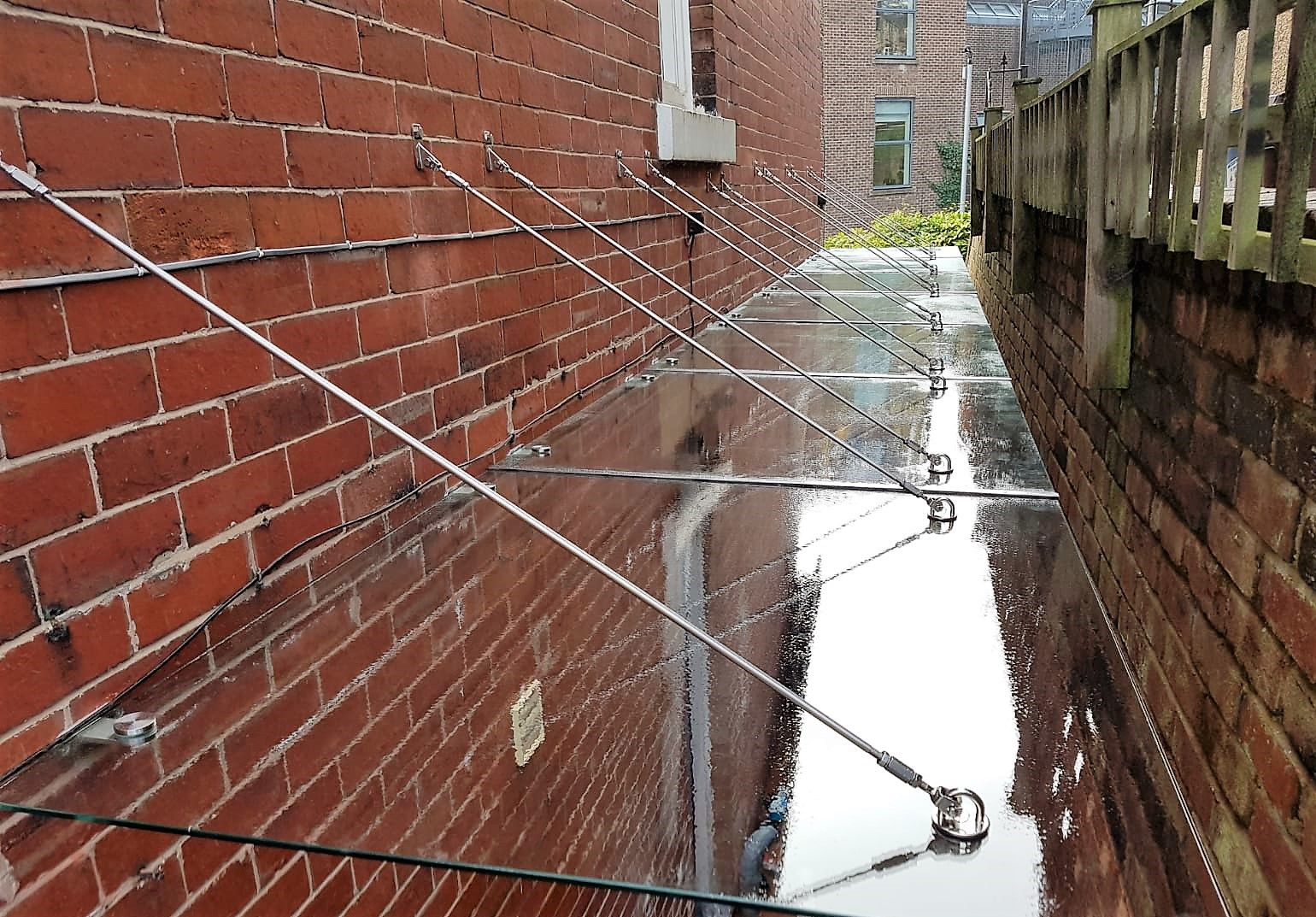 Glass alleyway canopy system